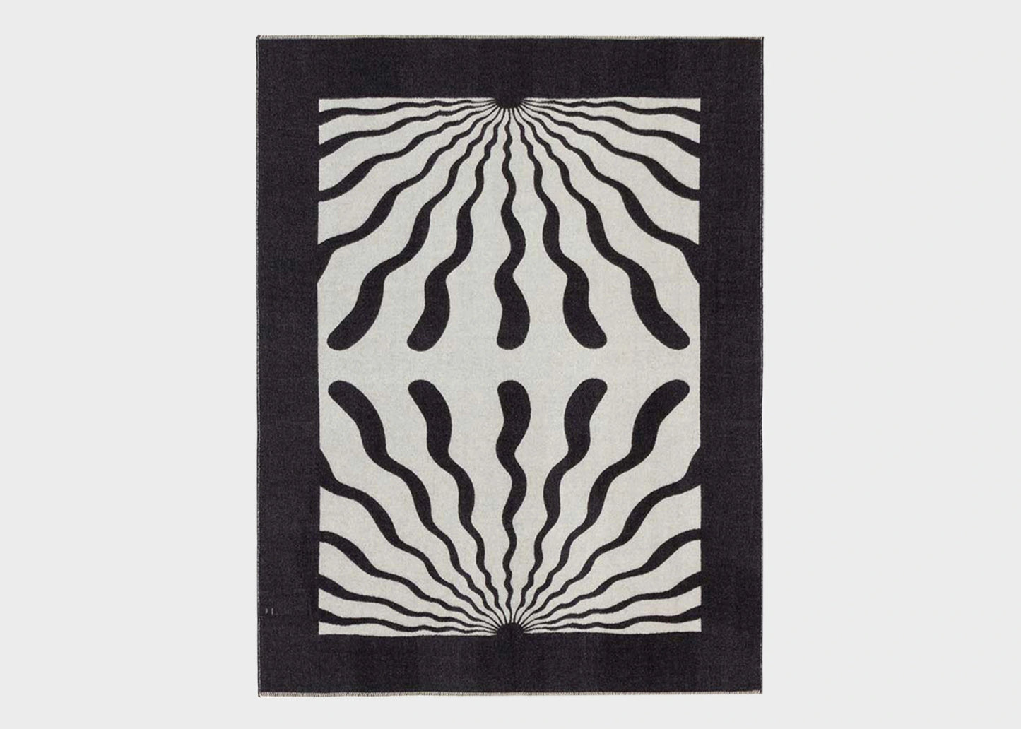An unfolded Dopamine Reversible Throw by Blacksaw as sold by Woodland Mod