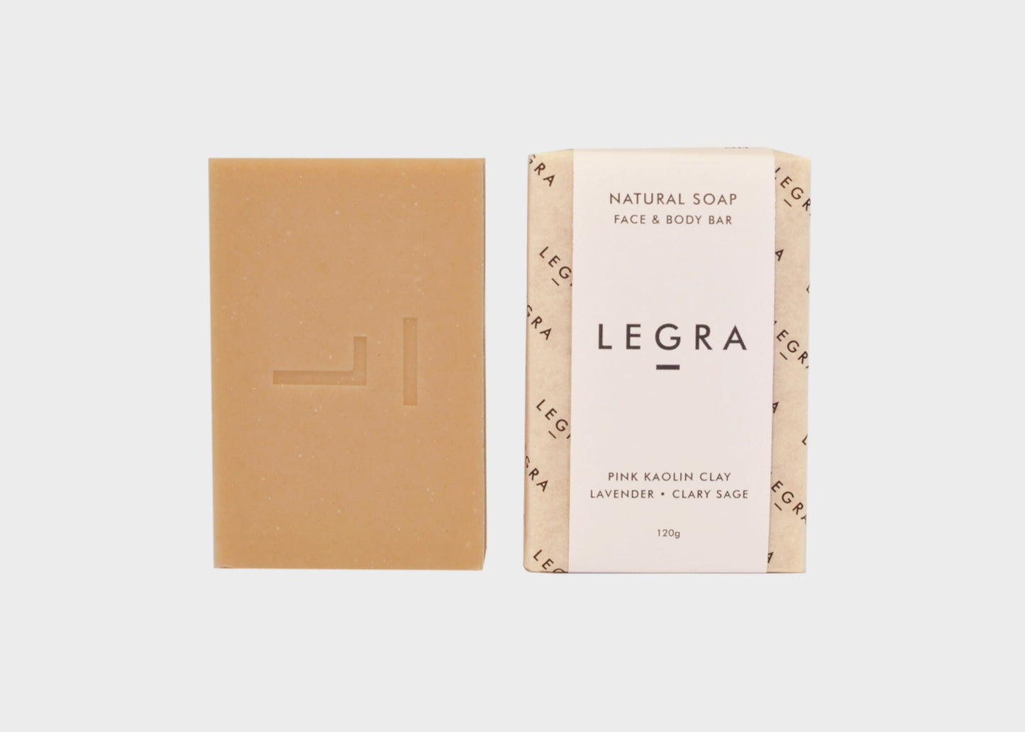 Pink Kaolin Clay Bar soap by Legra next to a packaged bar soap with the Legra logo.
