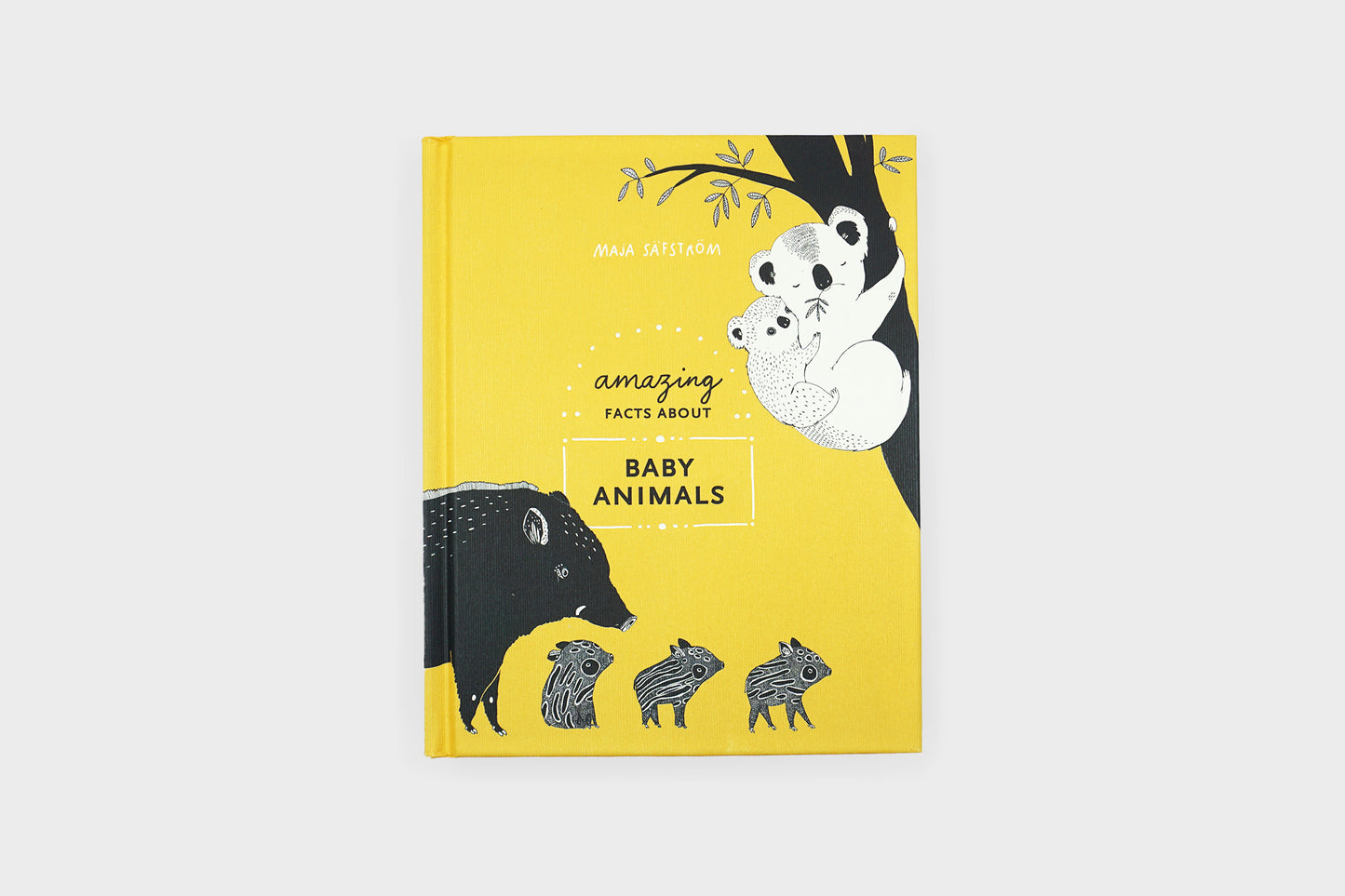 Amazing Facts About Baby Animals yellow book cover by Maja Safstrom as sold by Woodland Mod.