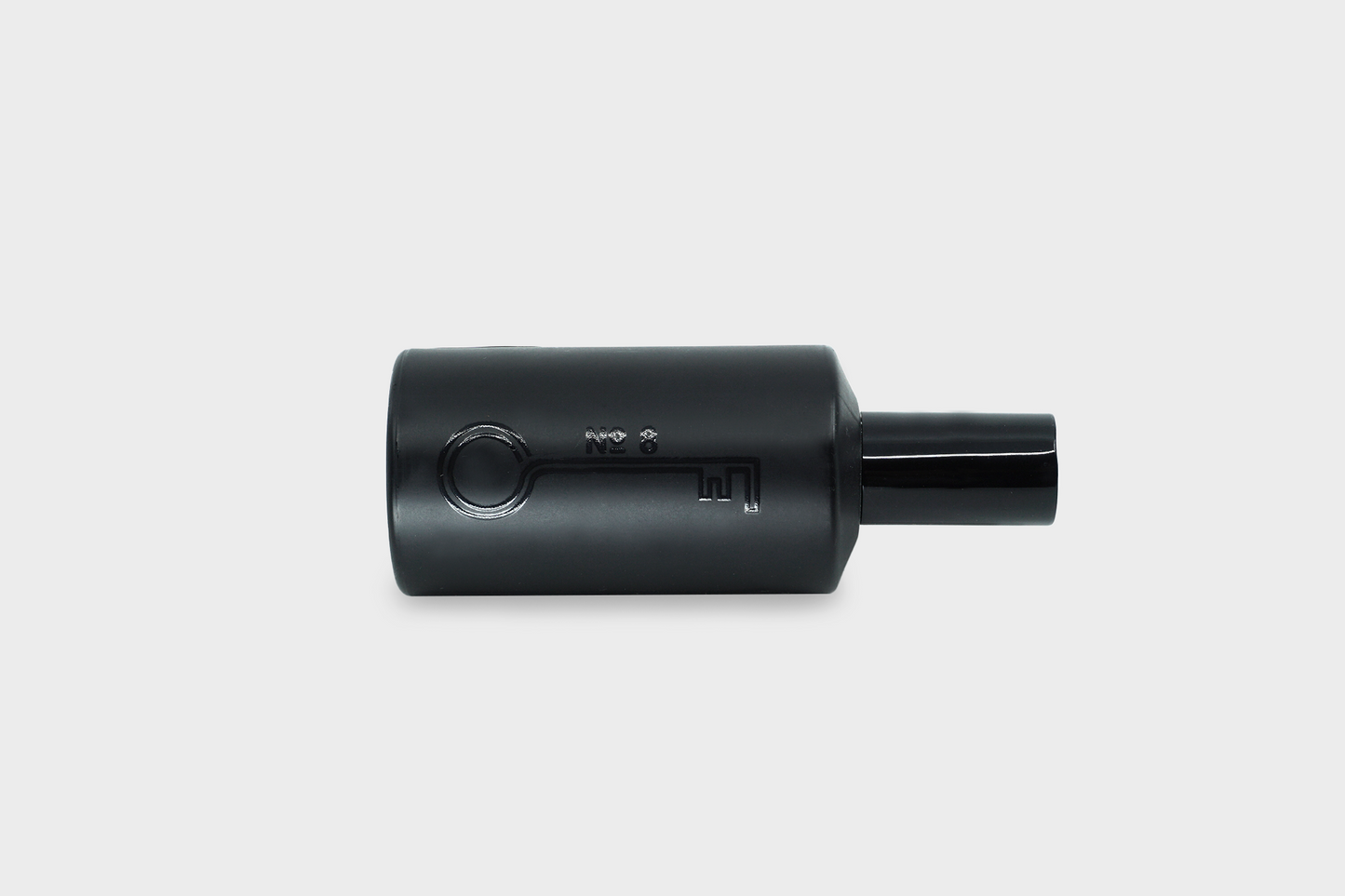 A black 50ml perfume bottle full of Fischersund's No 8 perfume on its side