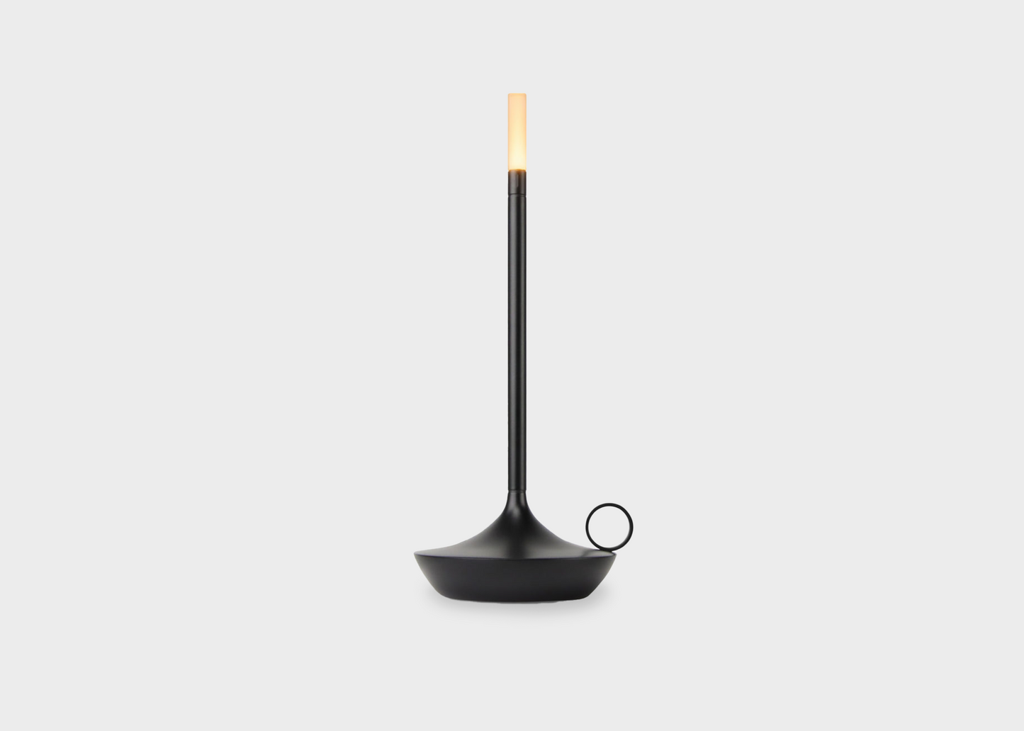 An illuminated Black Wick Lamp by Graypants as sold by Woodland Mod