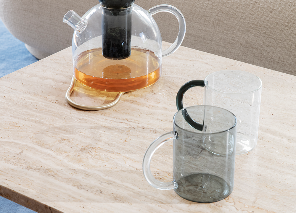 Still mugs grey and clear by Ferm Living on a table top