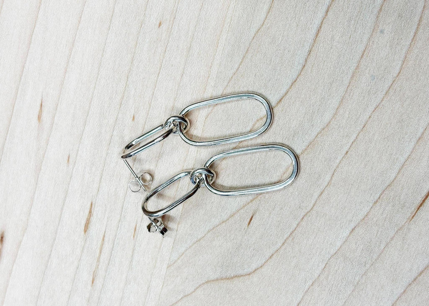 
                  
                    Cartouche Earrings
                  
                