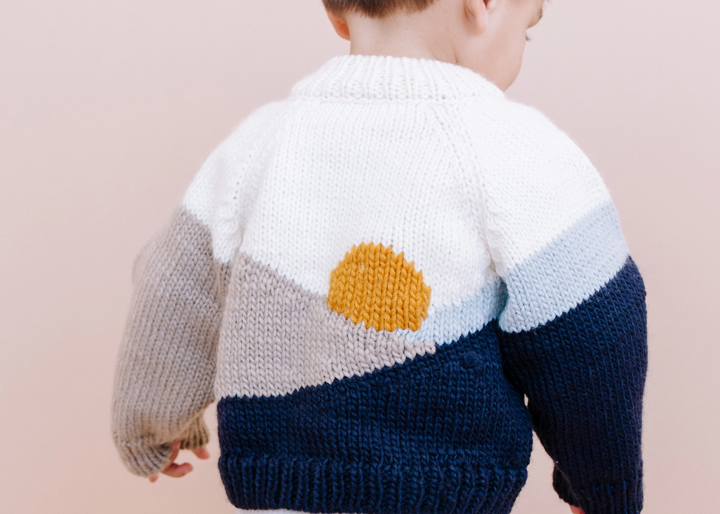 
                  
                    Navy Sunset Cardigan
                  
                
