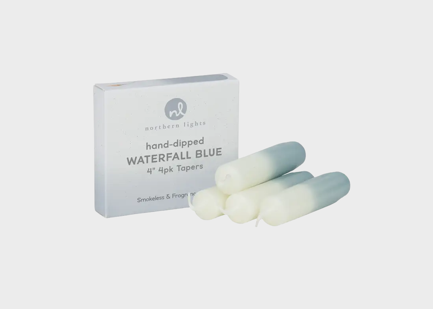 
                  
                    Hand-dipped waterfall blue candles with packaging on a white background
                  
                
