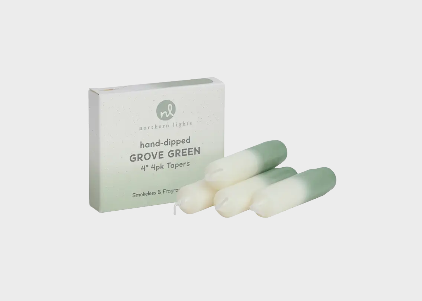 
                  
                    Grove Green hand-dipped candles with packaging on a light gray background
                  
                