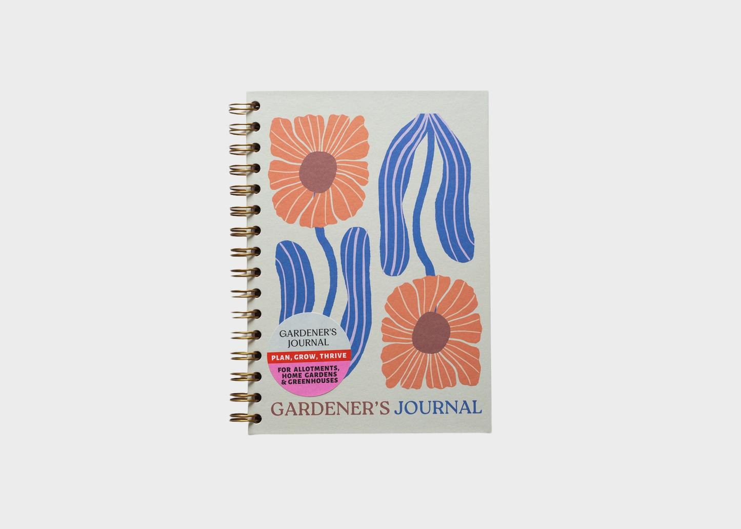 
                  
                    A spiral-bound garden journal with a light gray cover featuring a retro floral illustration in orange and blue, with the title 'GARDENER'S JOURNAL' printed on the front.
                  
                