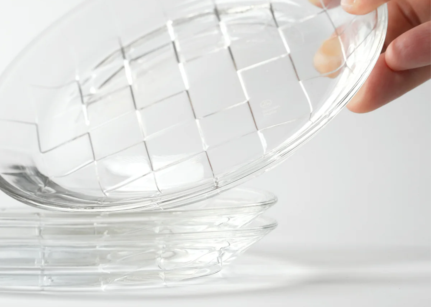 
                  
                    Woven Glass Plate
                  
                