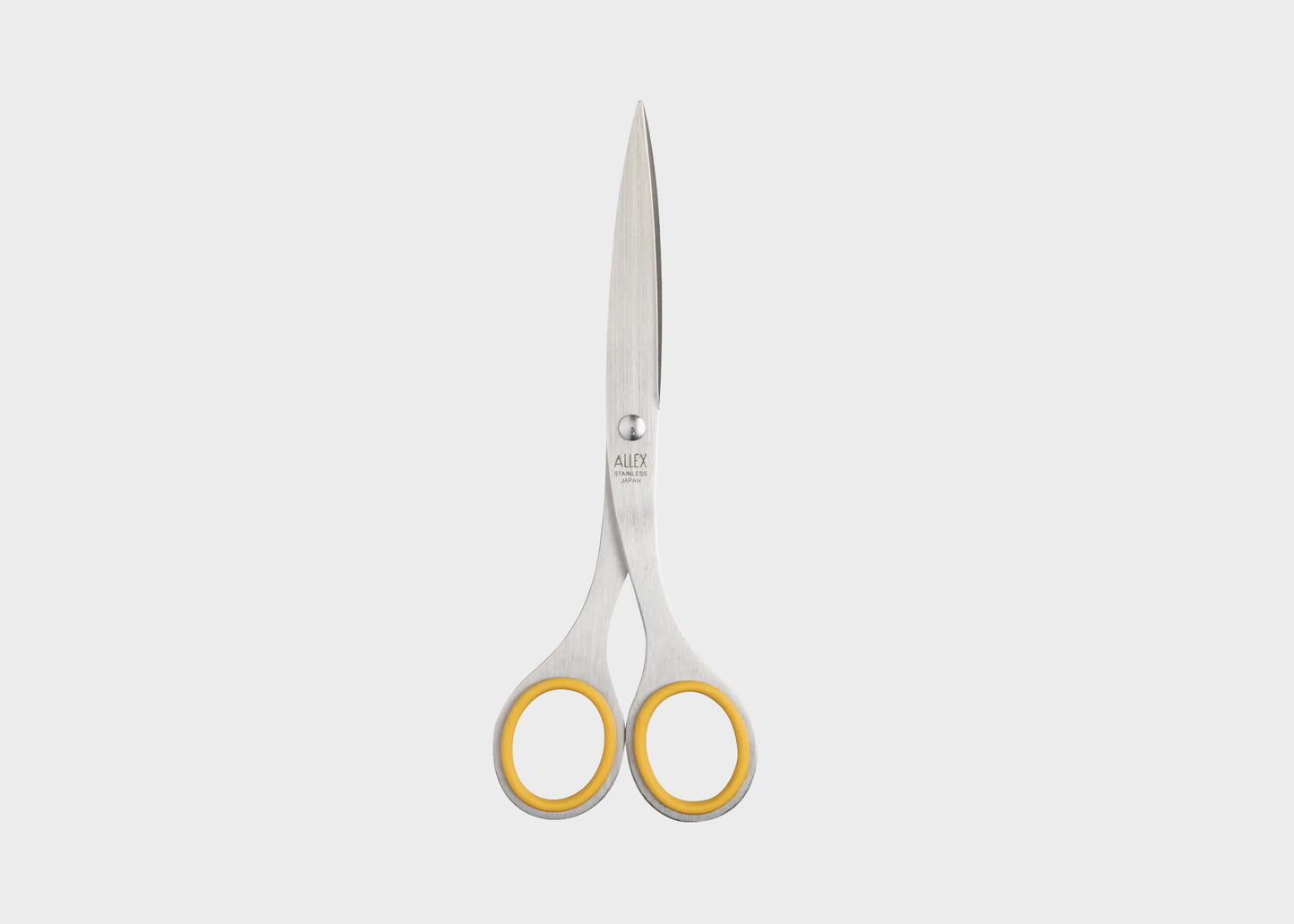 
                  
                    A pair of scissors with silver stainless steel blades and yellow-gold textured handles, centered on a light gray background.
                  
                