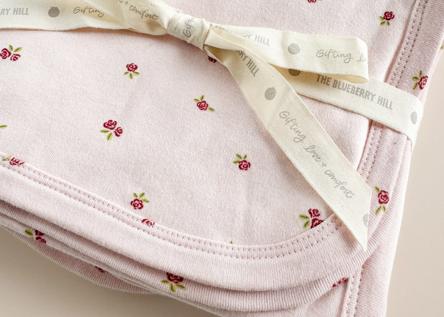 
                  
                    Knit Swaddle Blanket
                  
                