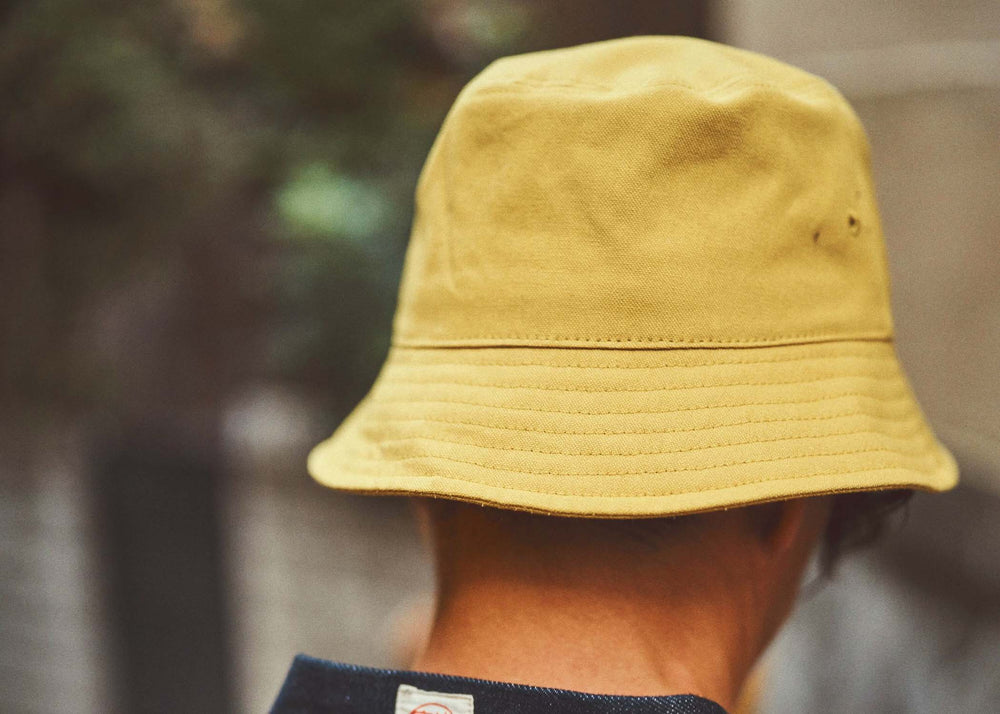 
                  
                    Niwaki Hiyoke Hat in Yellow as sold by Woodland Mod
                  
                