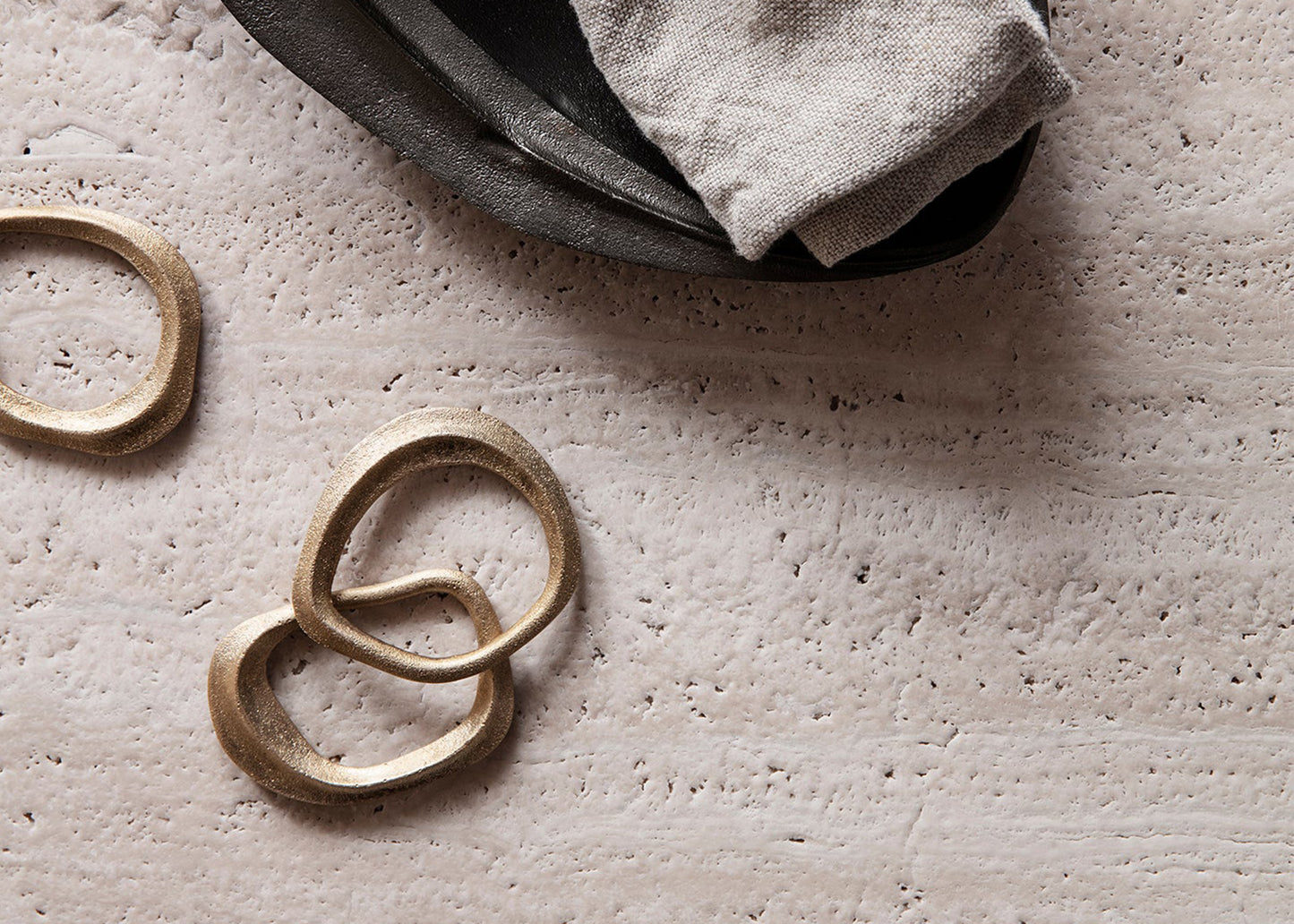 
                  
                    Flow Napkin Ring Set by Ferm Living in Brass
                  
                