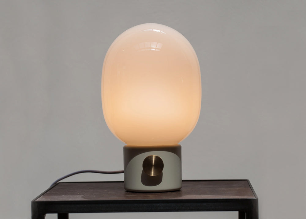 JWDA Table Lamp - Alabaster White by MENU lit up