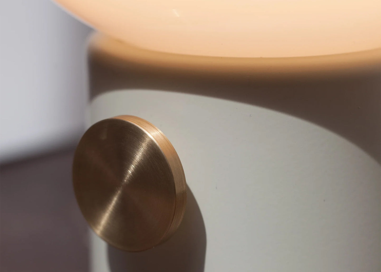 
                  
                    JWDA Table Lamp - Alabaster White by MENU close up of knob
                  
                