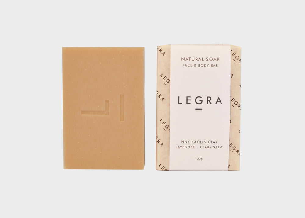 
                  
                    Pink Kaolin Clay Bar soap by Legra next to a packaged bar soap with the Legra logo.
                  
                