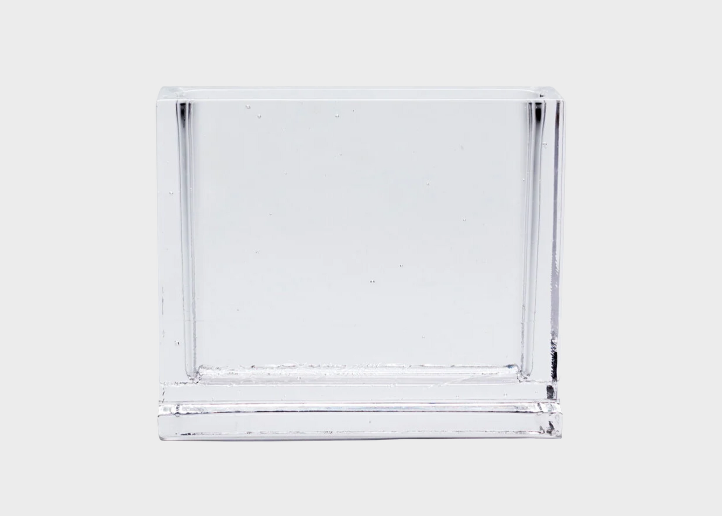 Clear glass block vase on a white background as sold by Woodland mod