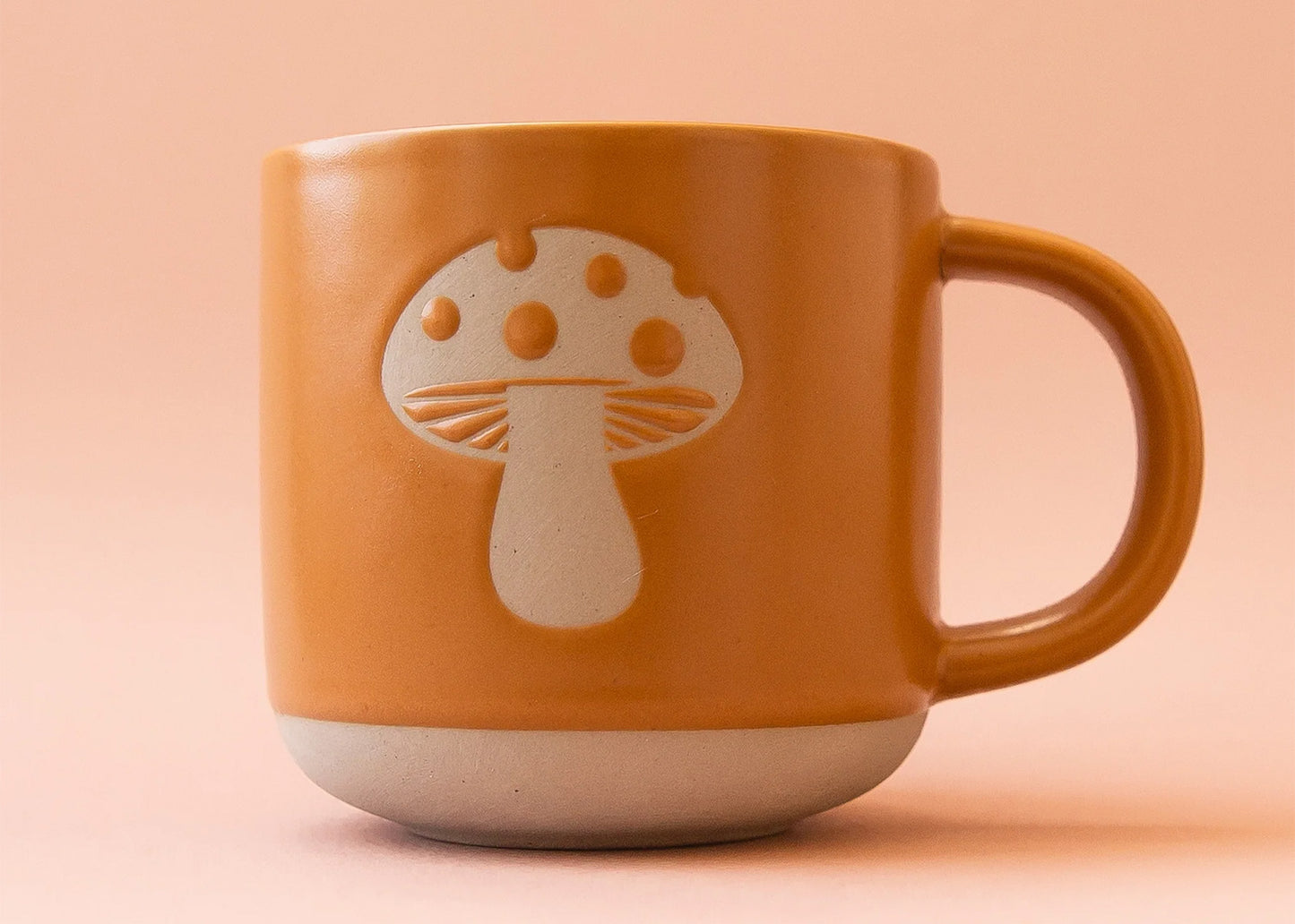 
                  
                    Orange Spice Ceramic Mushroom Mug by Sunshine Studios
                  
                