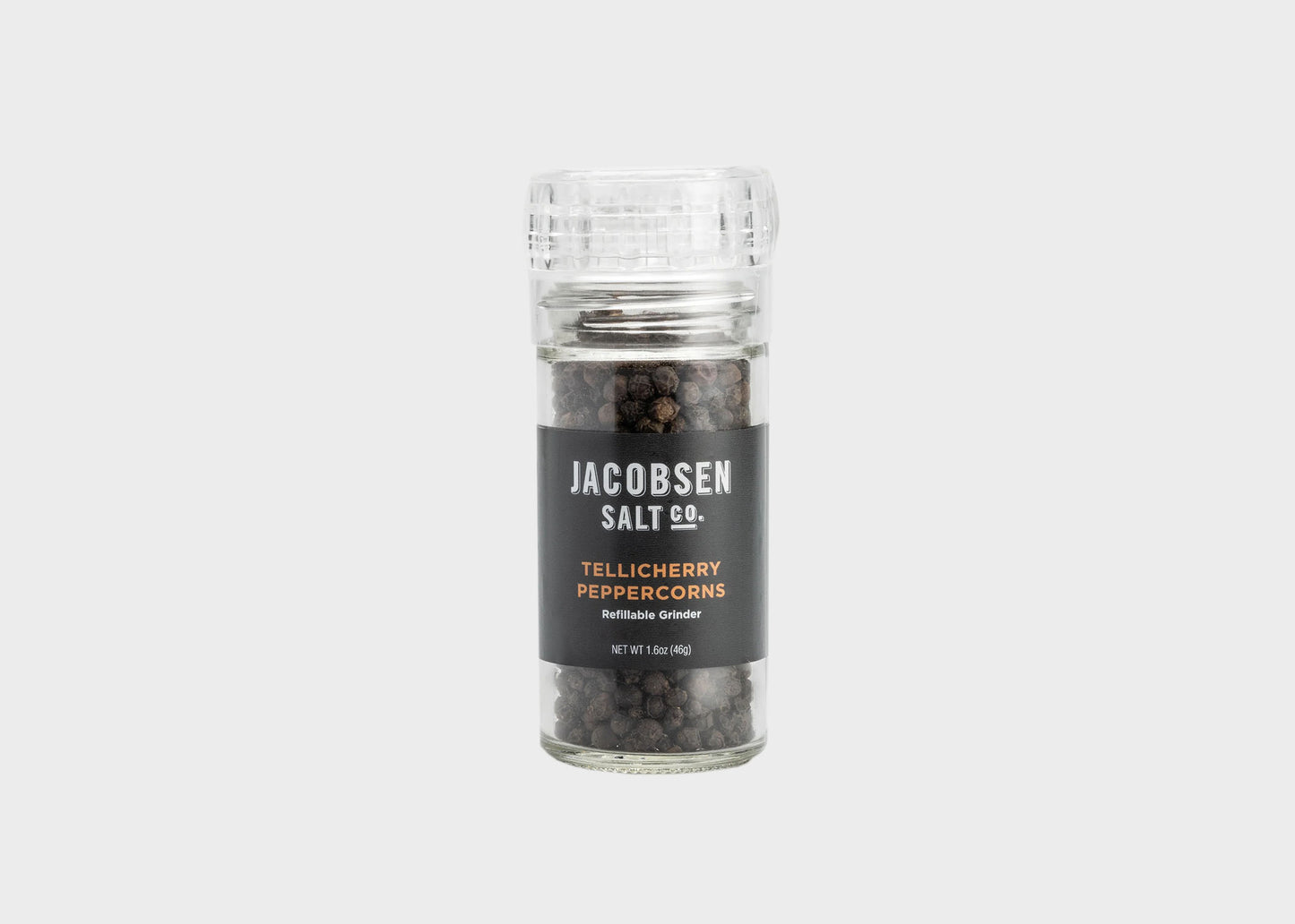 
                  
                    Tellicherry Peppercorns Jacobsen Salt Co in a glass grinder as sold by Woodland Mod
                  
                