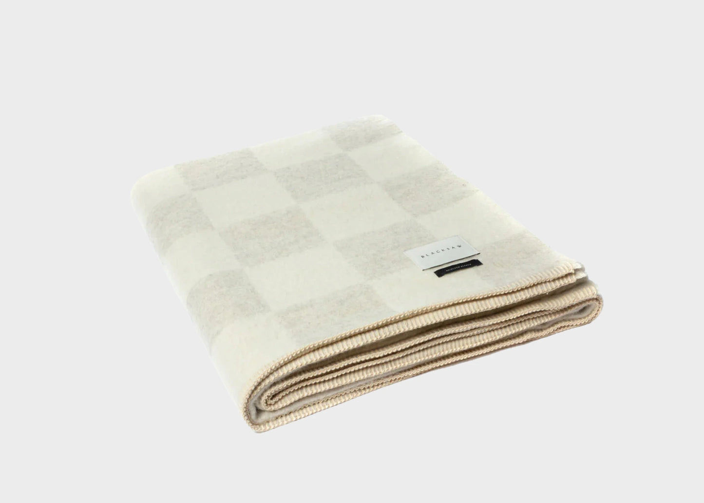 A folded Crosby Heirloom Blanket Shoji/Ivory by Blacksaw as sold by Woodland Mod