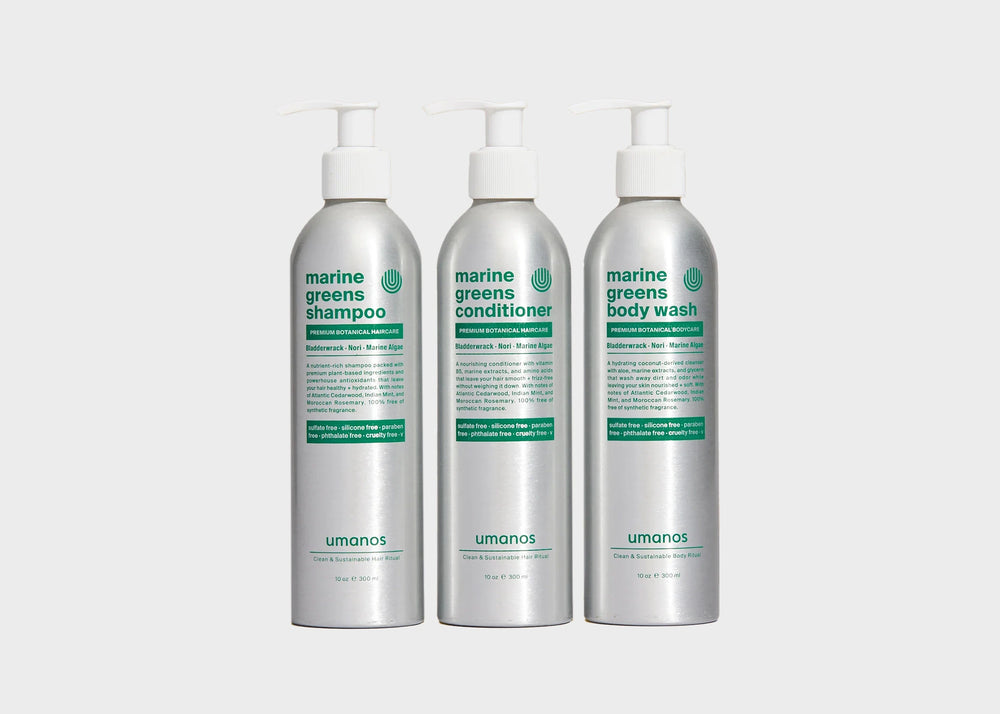 Umanos Marine Greens Sustainable Shower Set containing three aluminum bottles with eco friendly shampoo, conditioner, and body wash.