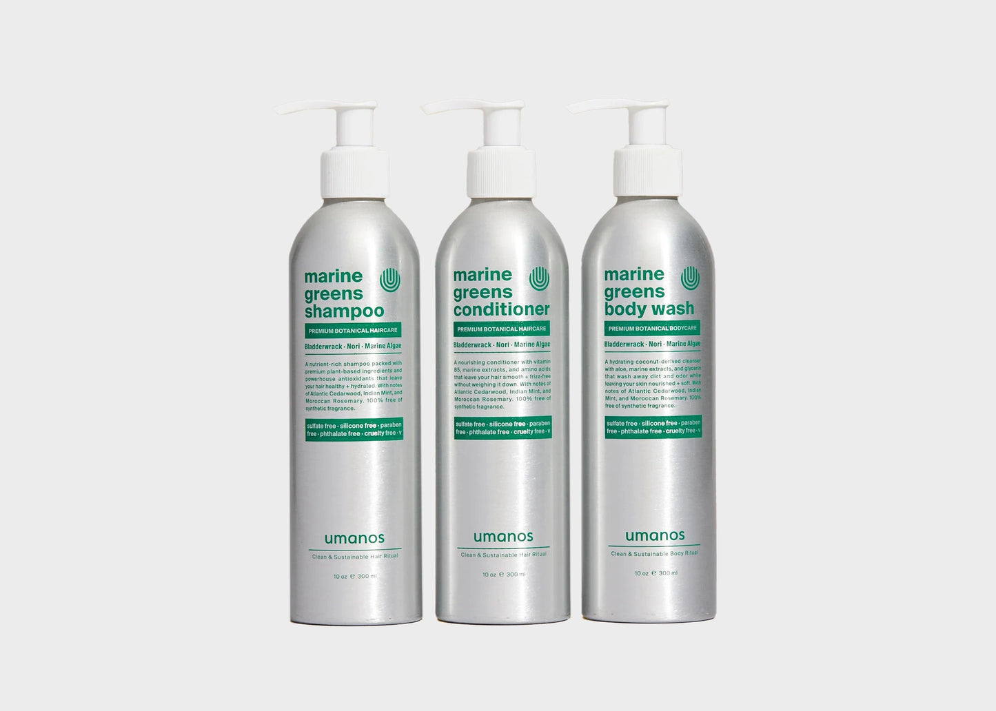 Umanos Marine Greens Sustainable Shower Set containing three aluminum bottles with eco friendly shampoo, conditioner, and body wash.