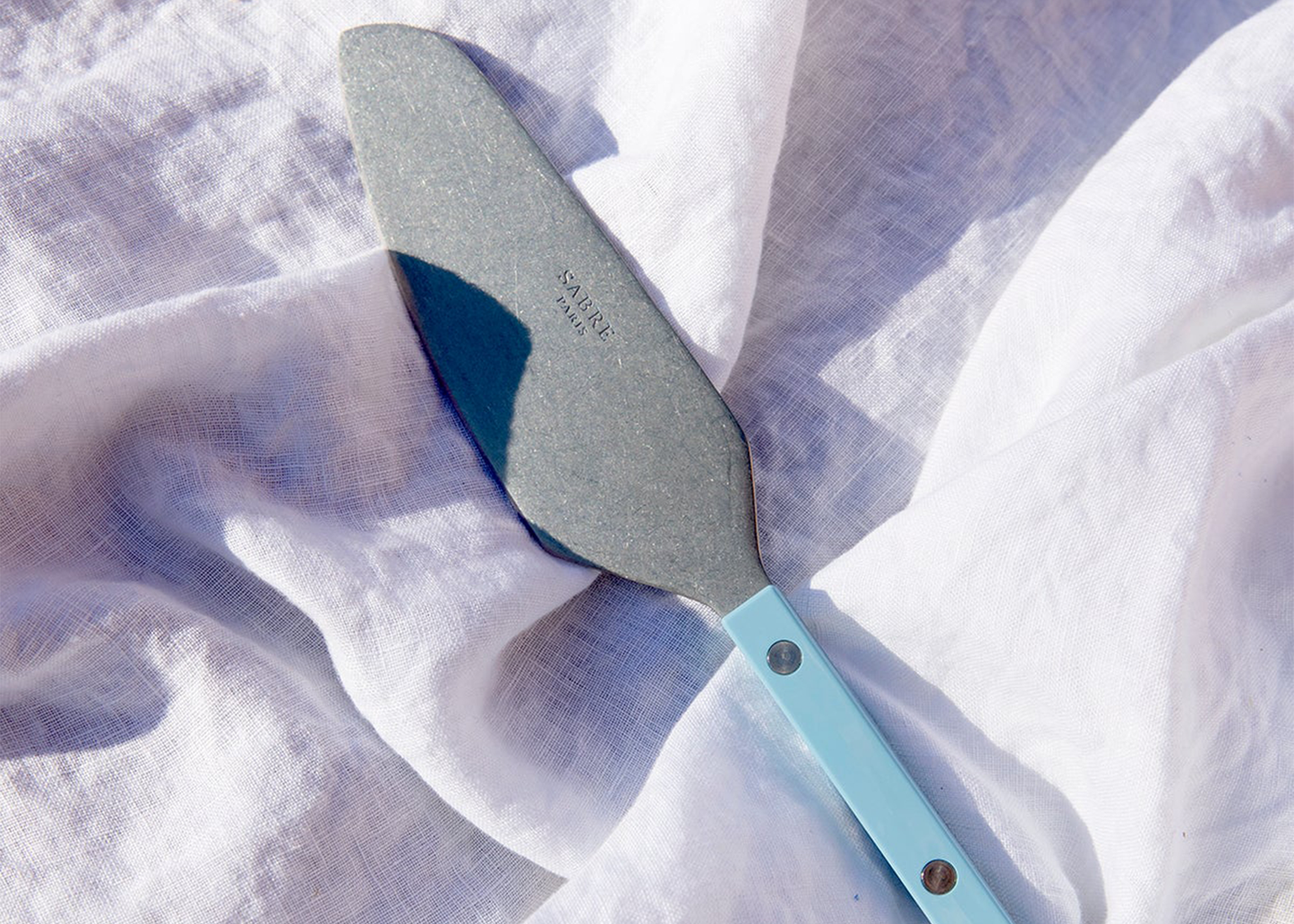 
                  
                    Tart Slicer
                  
                