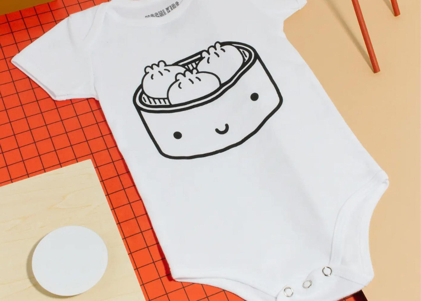 
                  
                    Dumpling Graphic Bodysuit
                  
                