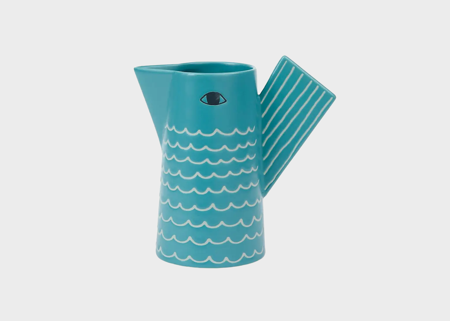 
                  
                    A turquoise ceramic pitcher with a stylized bird design, featuring white wavy lines on the body and a striped handle, set against a light gray background.
                  
                