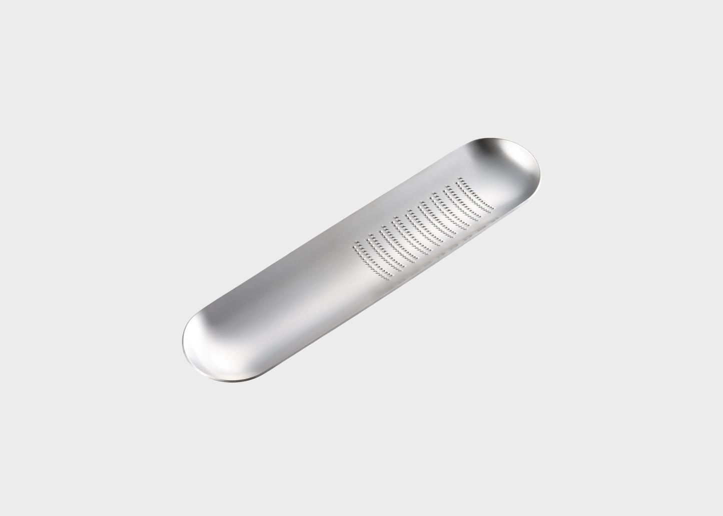 
                  
                    Oros Grater
                  
                