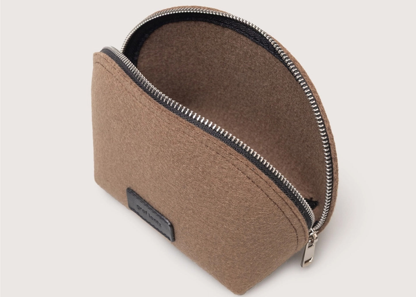 
                  
                    Pochi Wool Pouch
                  
                