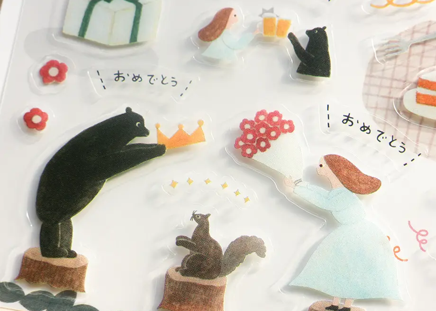 
                  
                    Decorative stickers with animal designs and text on a white background
                  
                