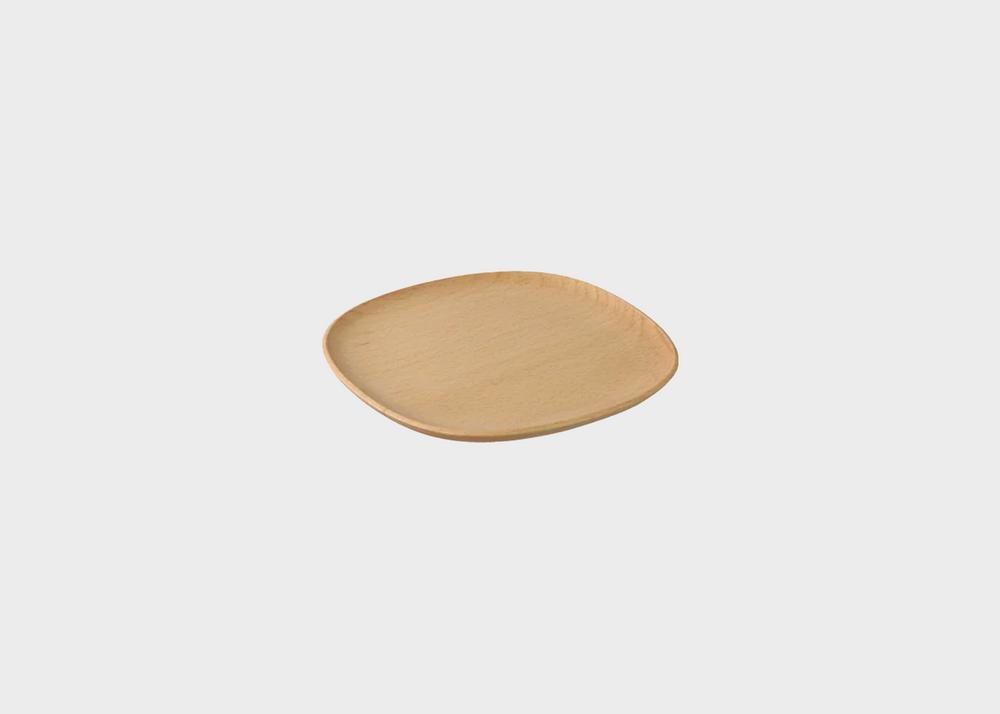 A single round beech wood coaster with a urethane coating.