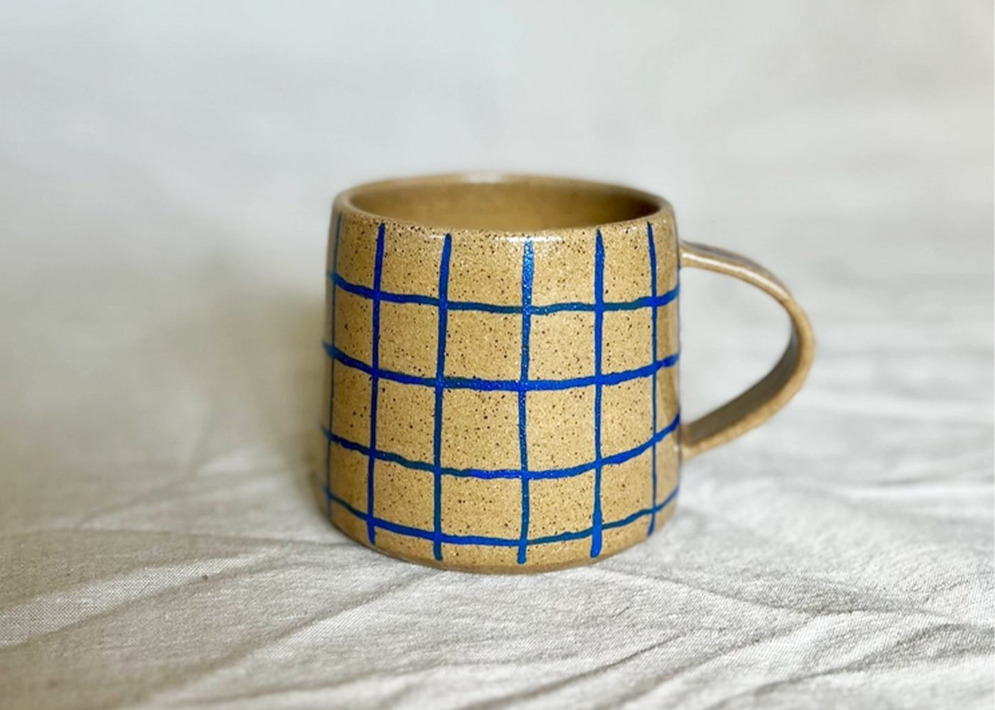 
                  
                    Checkered Mug
                  
                