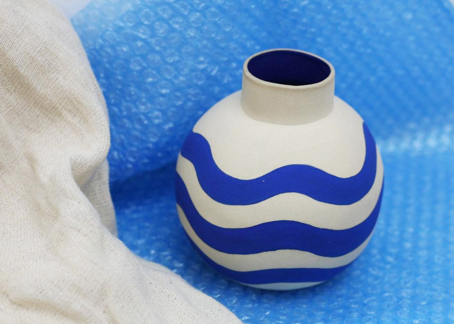 
                  
                    Round Brushstroke Vase Blue by Sofie Alda
                  
                