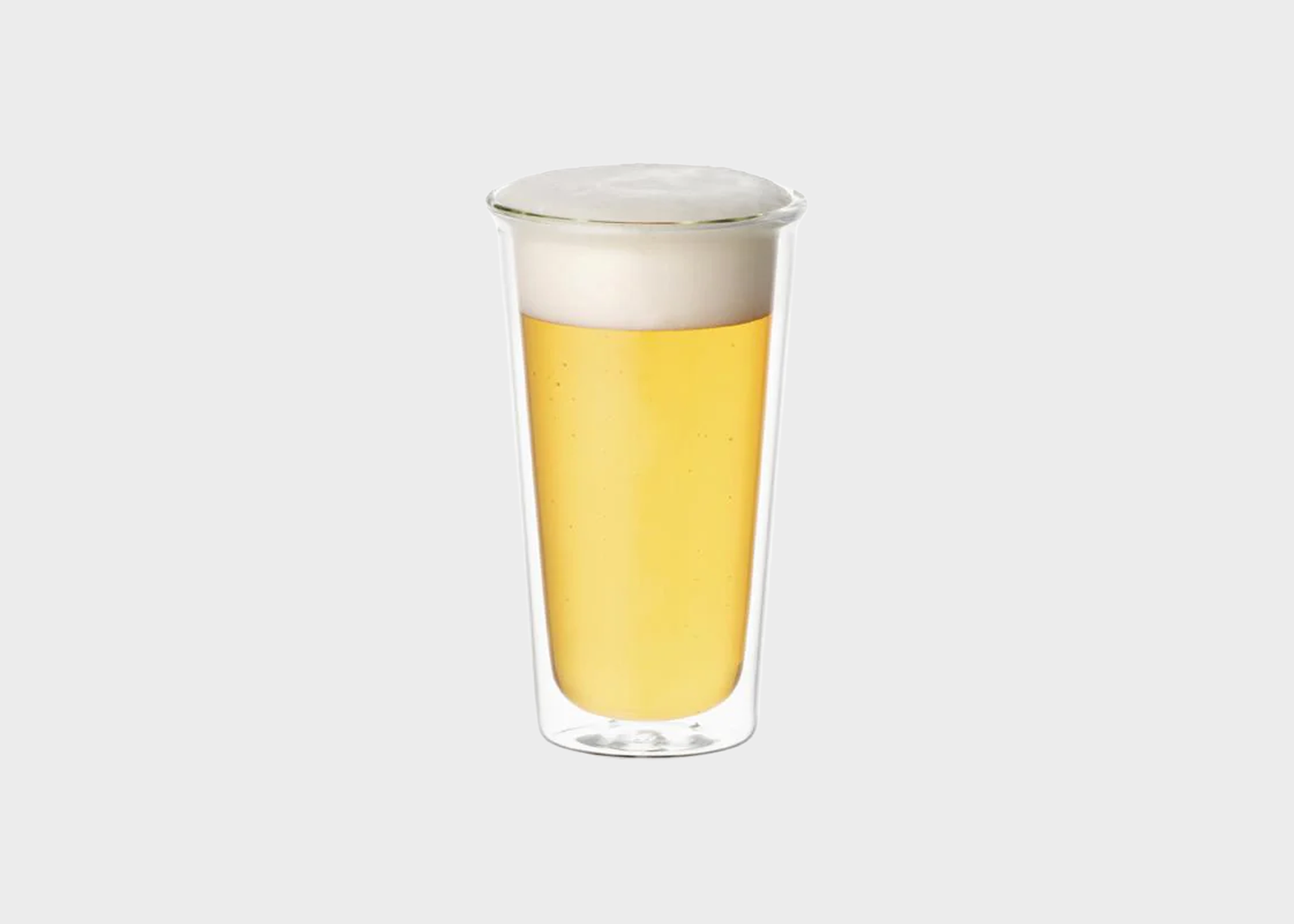 
                  
                    Clear glass with a beer in it on a light gray background
                  
                