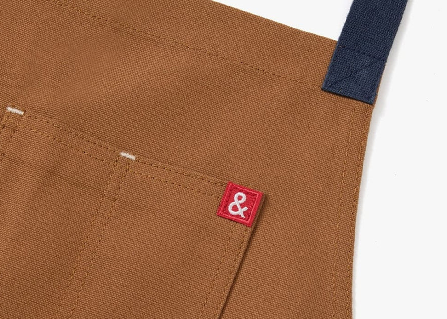 
                  
                    The All Day Crossback Apron
                  
                
