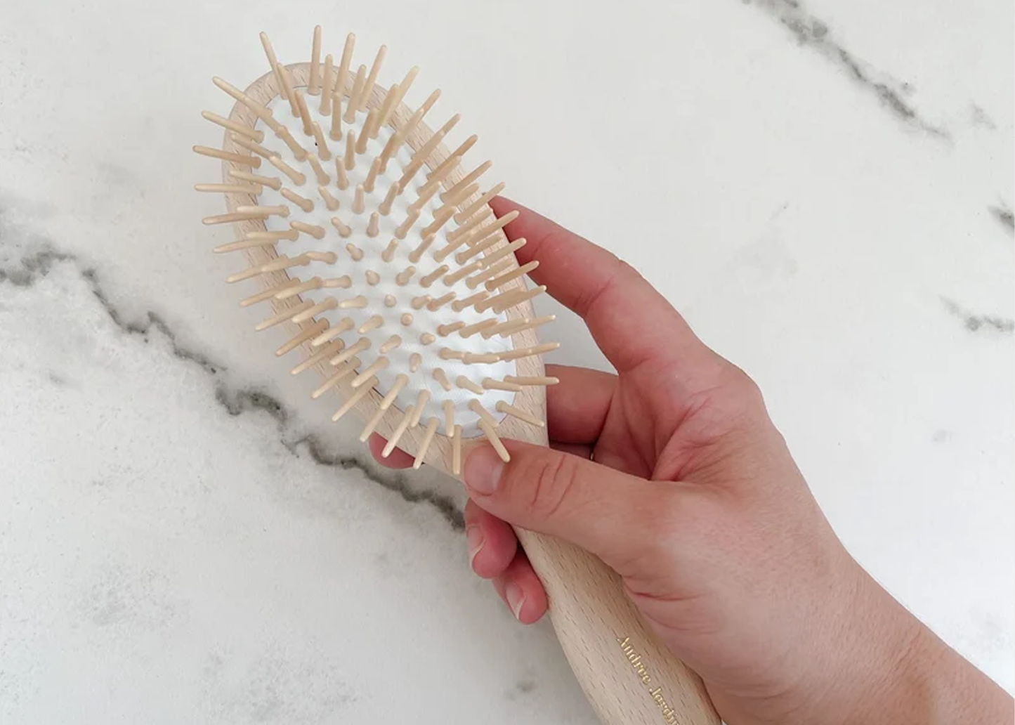 
                  
                    AJ Detangling Brush
                  
                