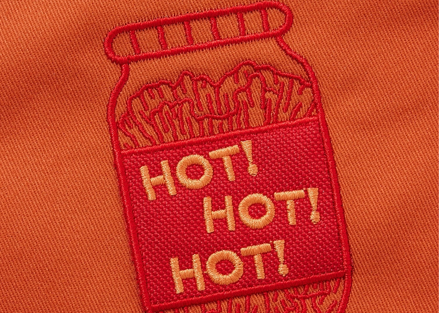 
                  
                    The All Day Crossback Apron
                  
                