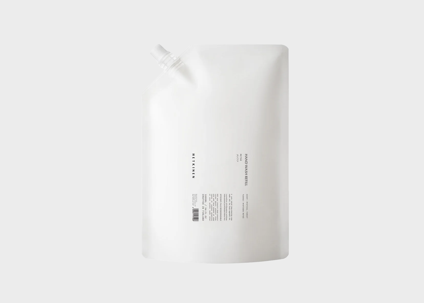 
                  
                    White bottle with a label on a light gray background
                  
                