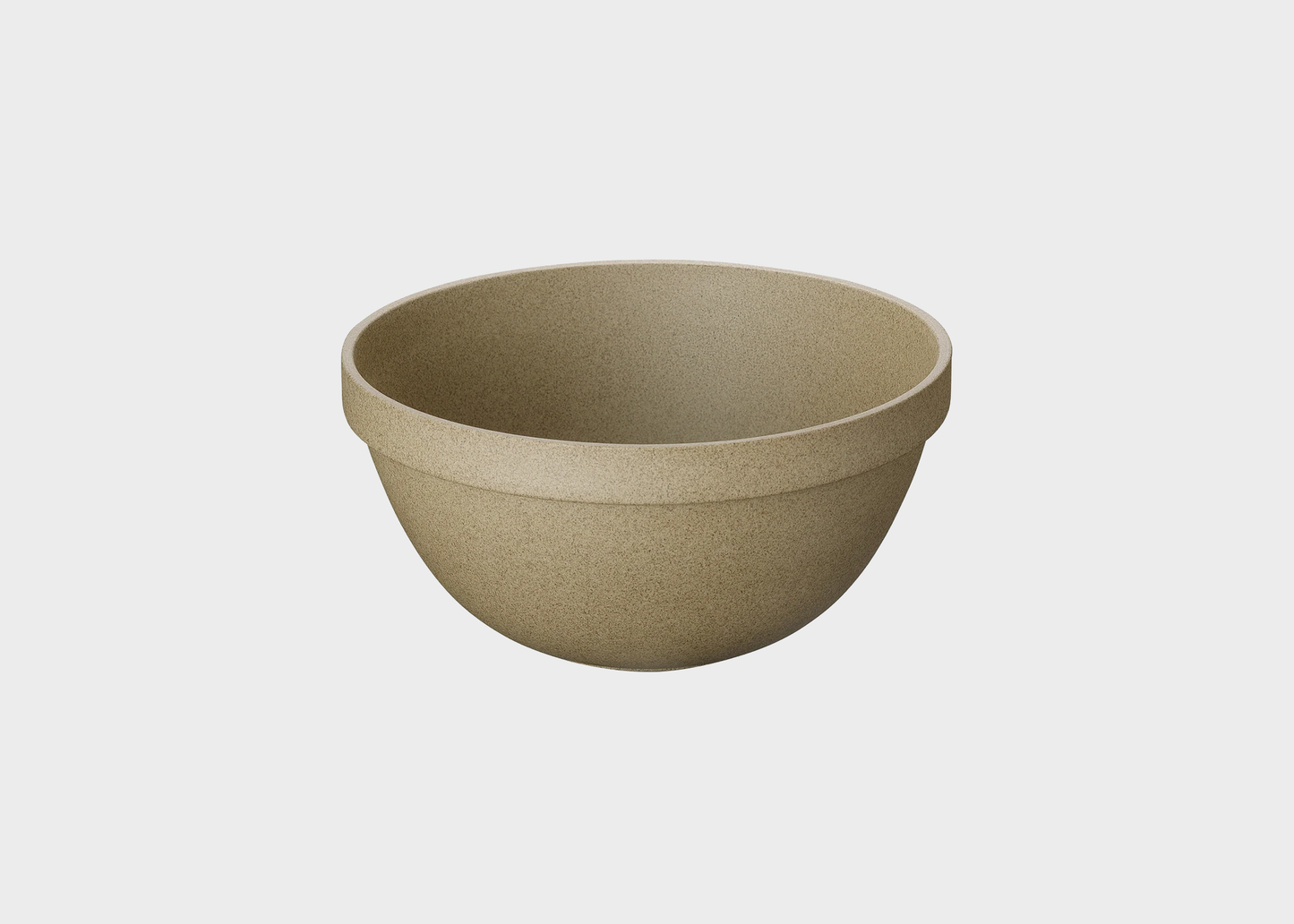 
                  
                    Beige ceramic bowl on a light gray background
                  
                