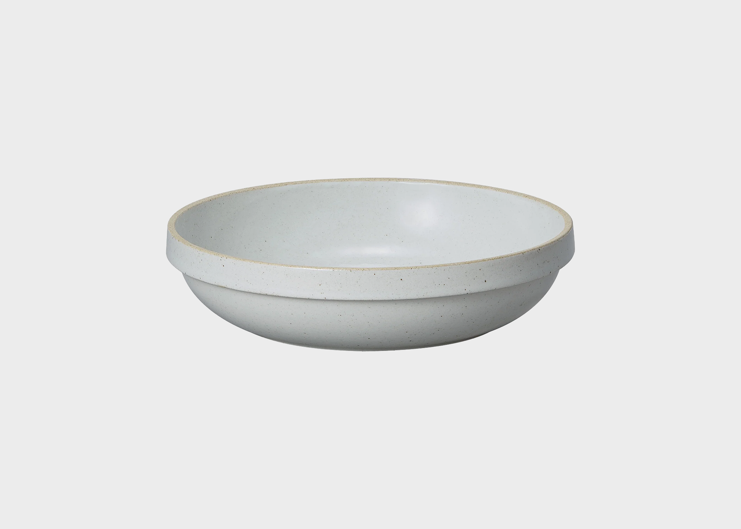 
                  
                    Light gray ceramic bowl on a white background
                  
                