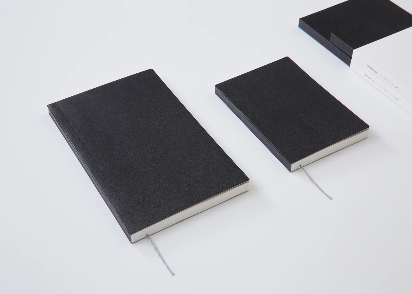 
                  
                    Ito Notebook - Black Grid
                  
                