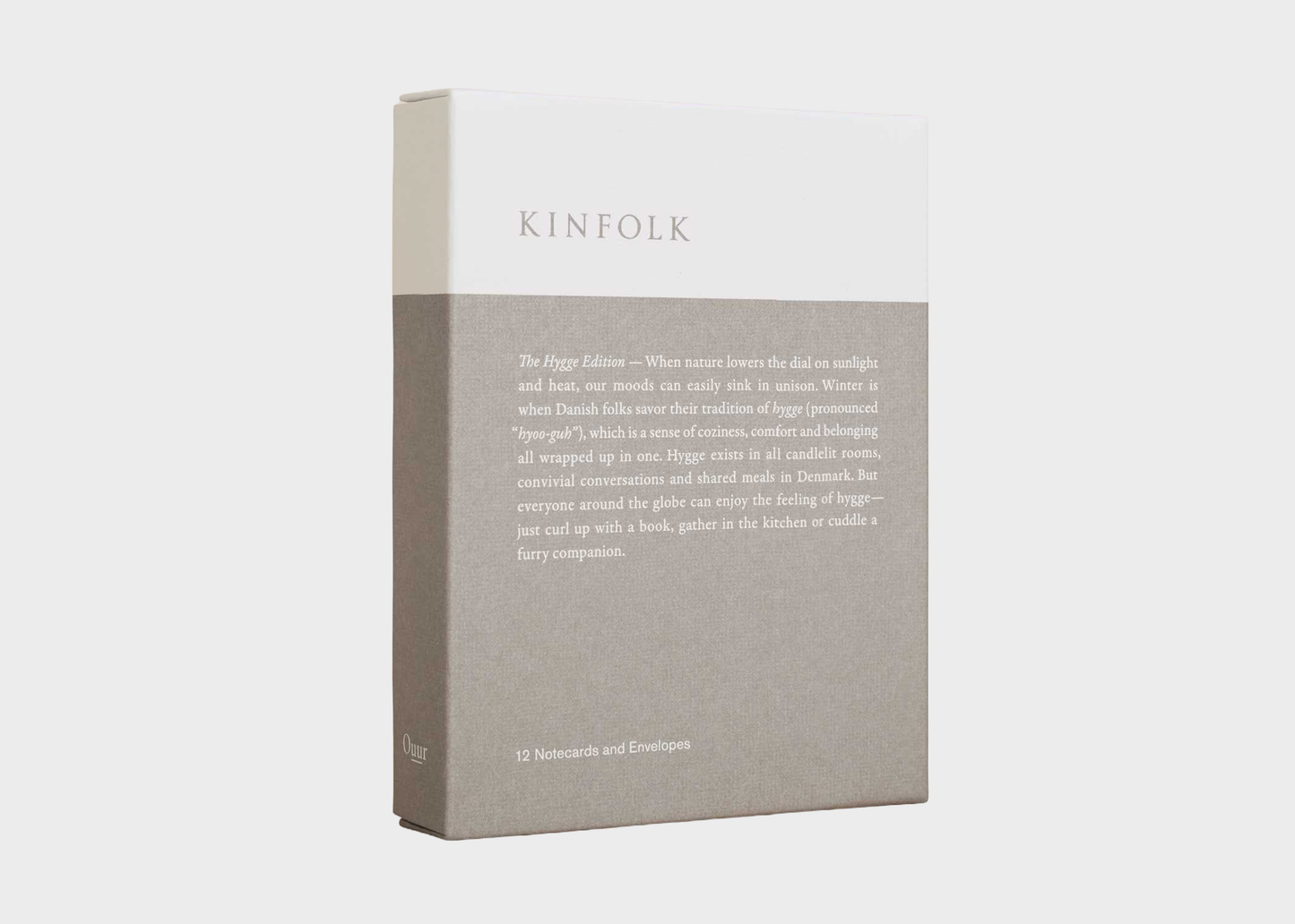 Gray box with 'KINFOLK' branding on a light gray background