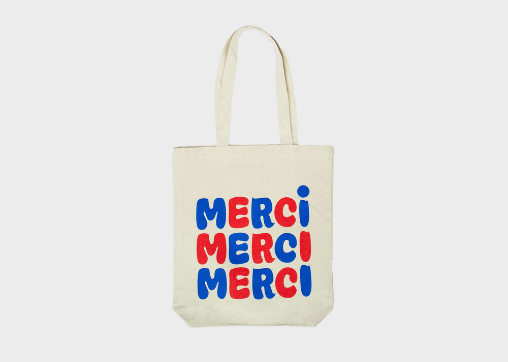 
                  
                    Merci Merci Graphic Tote
                  
                