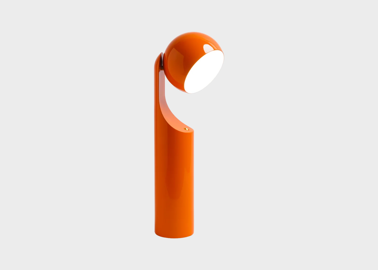 
                  
                    Orange and white lamp on a light gray background
                  
                