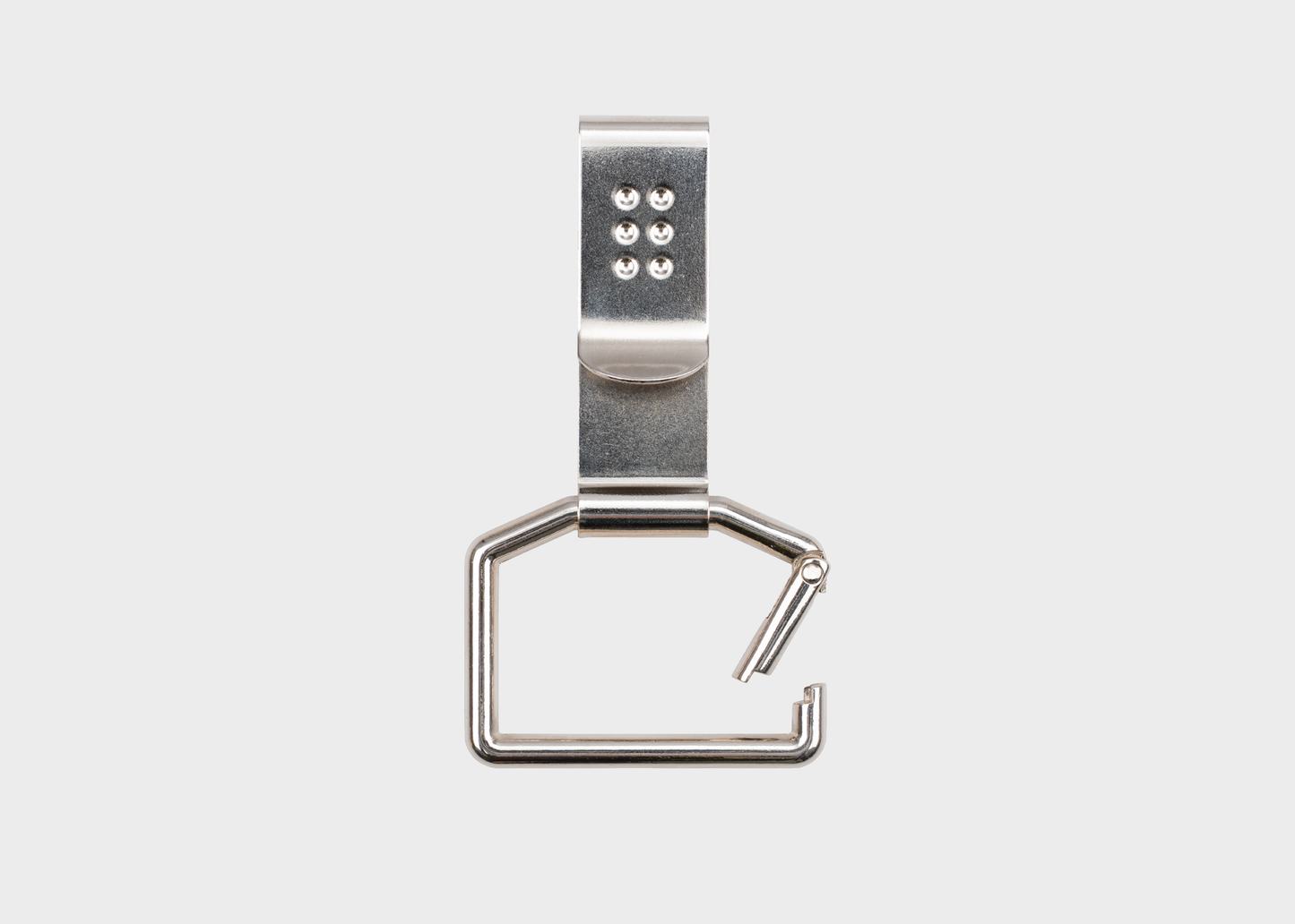 
                  
                    Metallic belt clip on a white background
                  
                