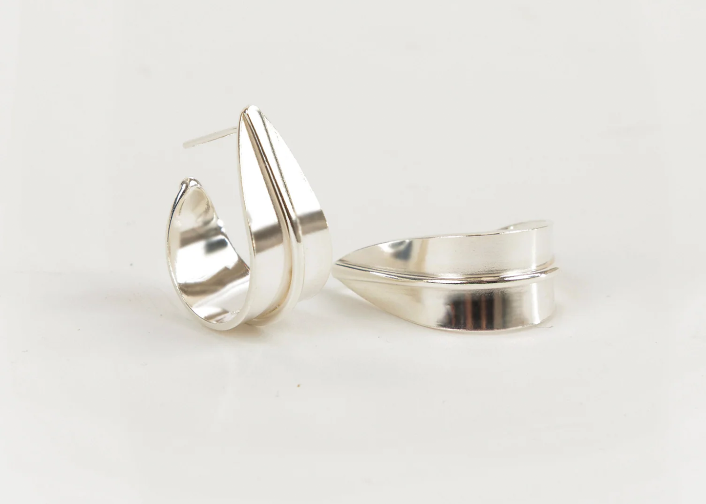 
                  
                    Palm Leaf Hoop Earrings
                  
                