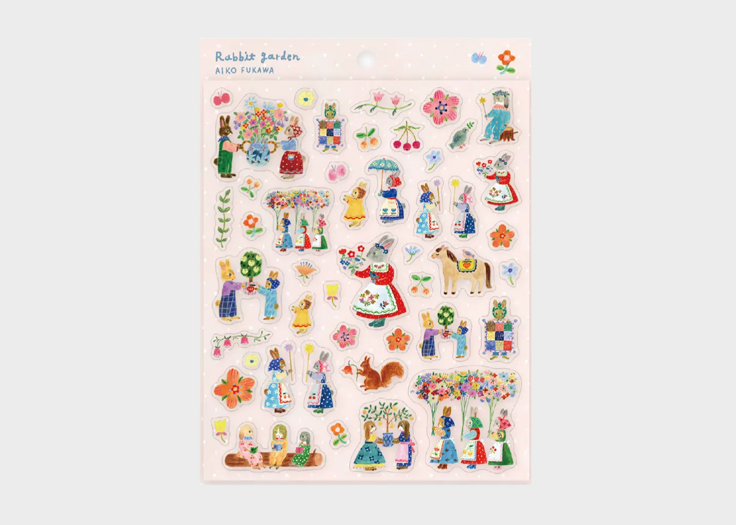 Sheet of colorful stickers featuring cartoon characters and objects on a light pink background.