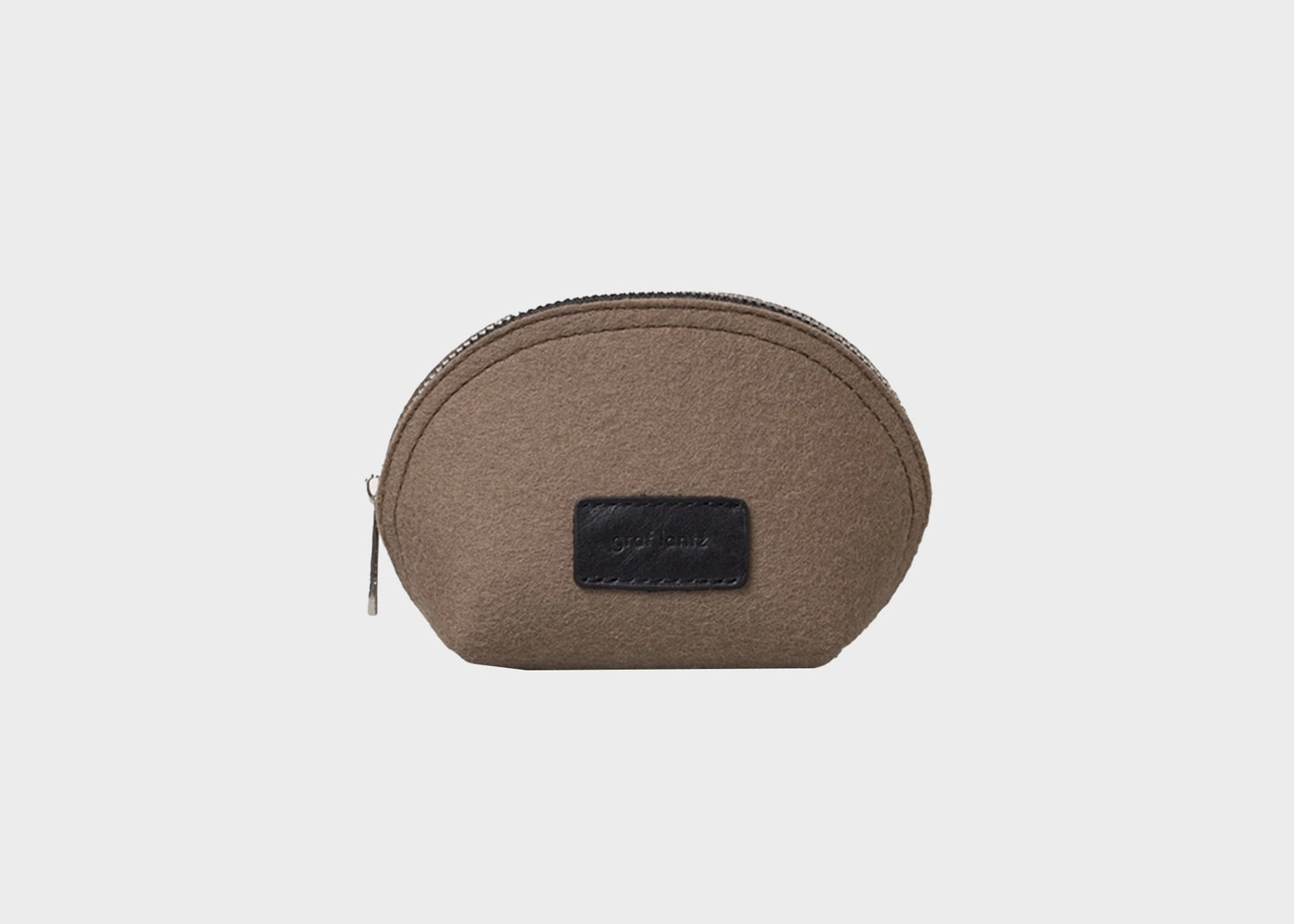 
                  
                    Pochi Wool Pouch
                  
                