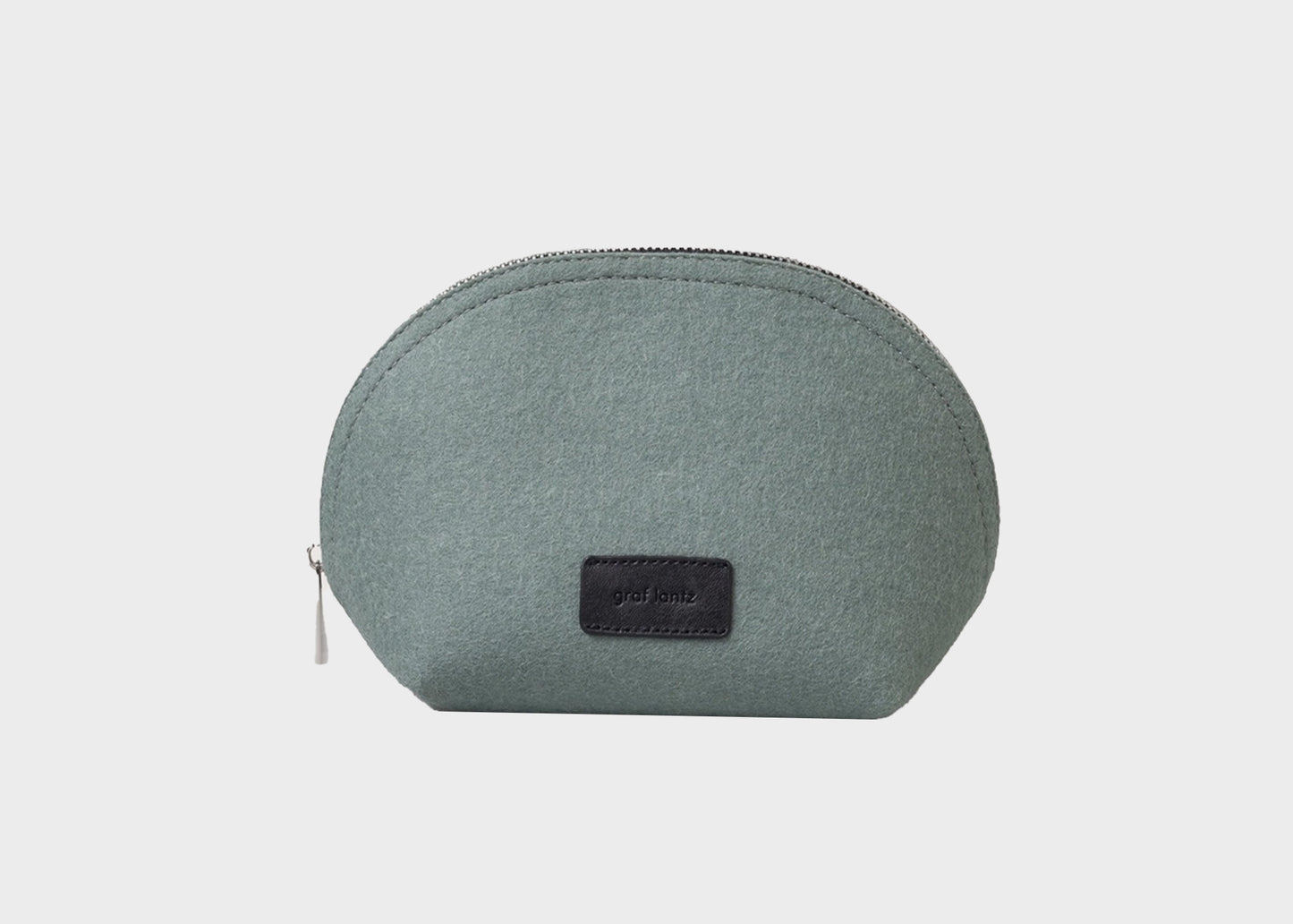 
                  
                    Pochi Wool Pouch
                  
                